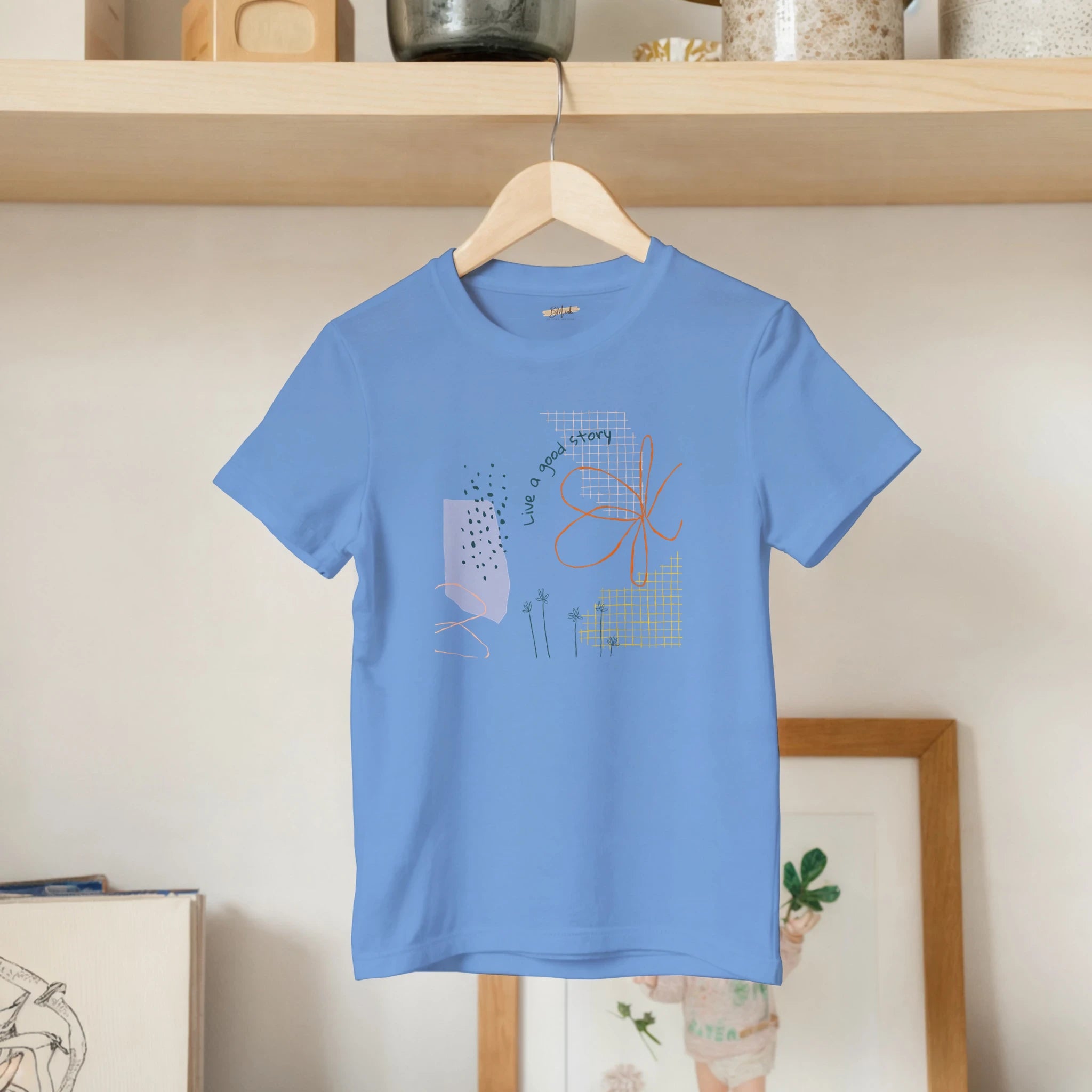 Kids T-Shirt · Live a Good Story Carolina Blue - BM ink.