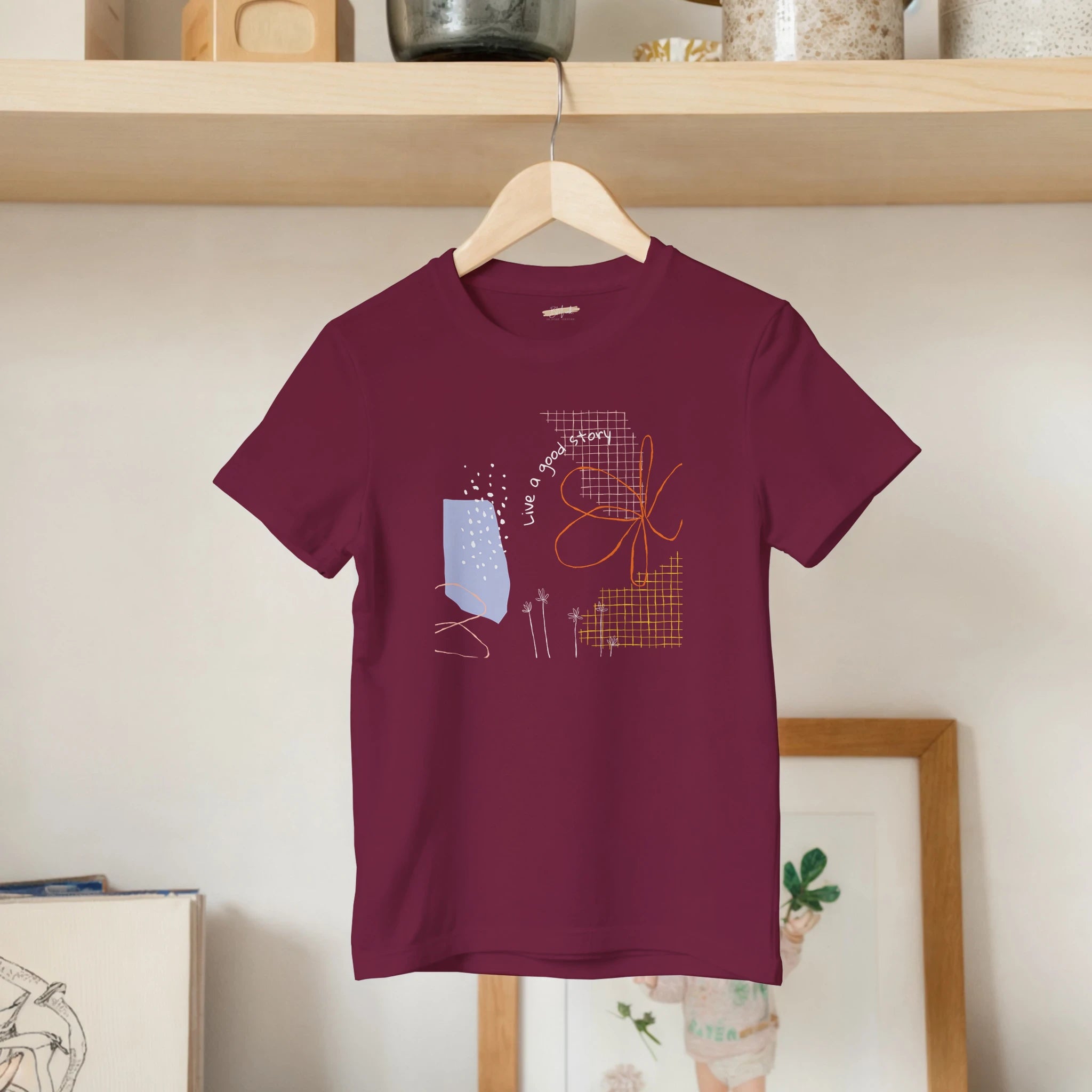 Kids T-Shirt · Live a Good Story Maroon - BM ink.