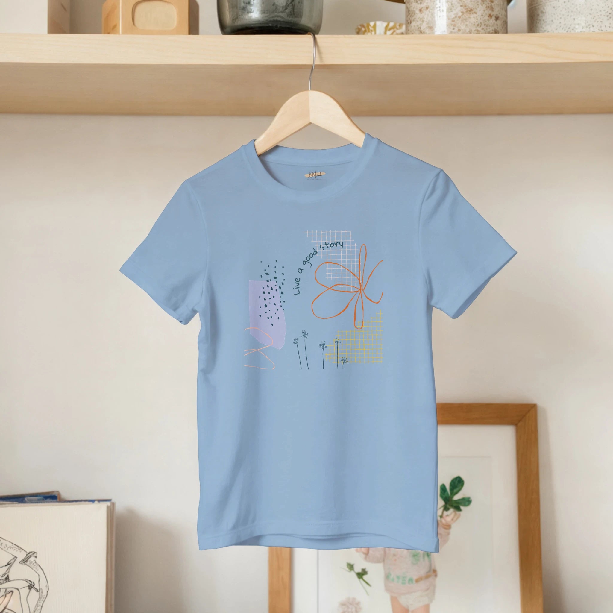 Kids T-Shirt · Live a Good Story Light Blue - BM ink.